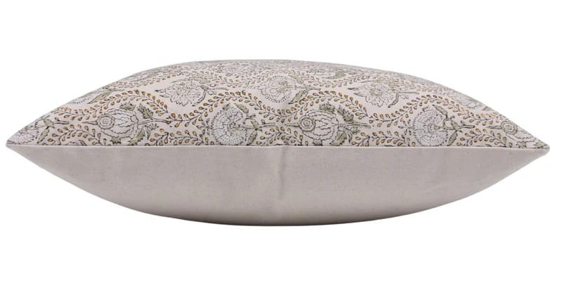 Decorative pillow with floral pattern on a beige background