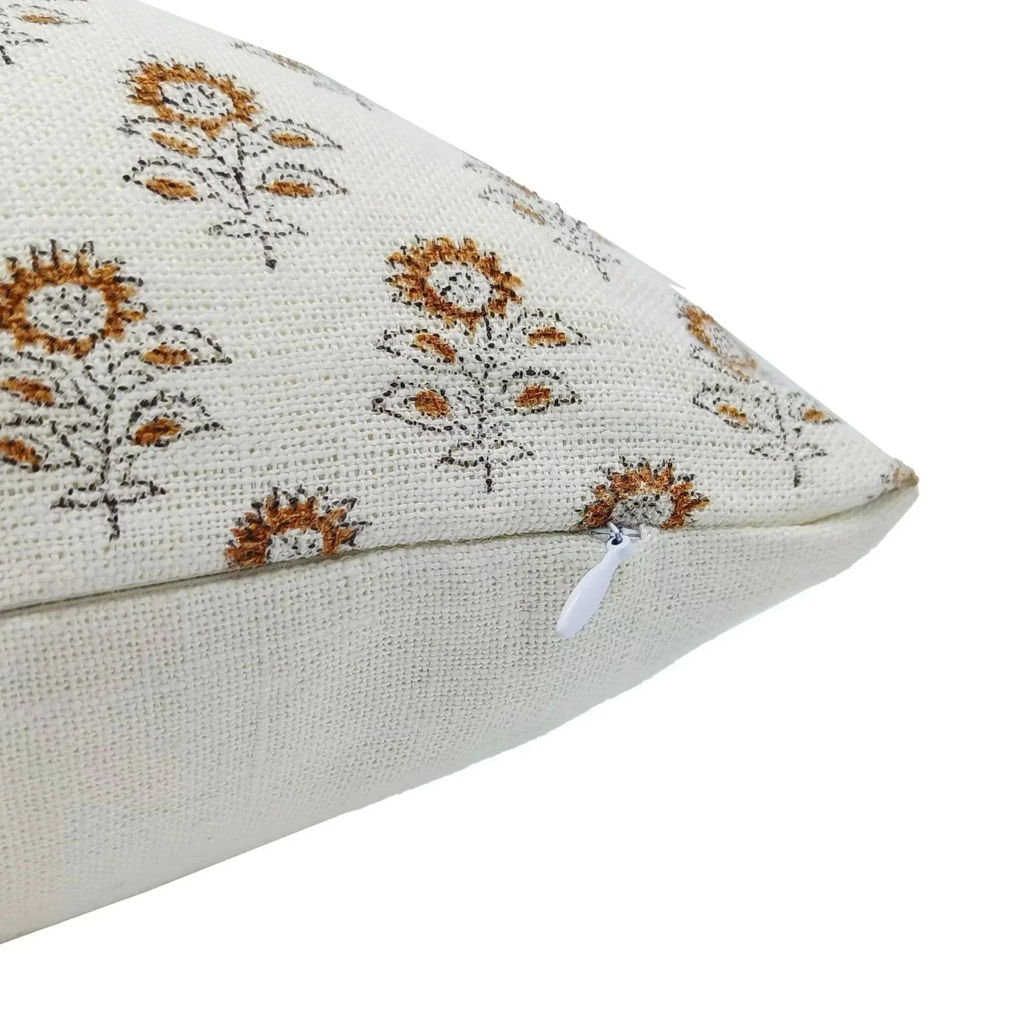 Decorative pillow with floral pattern on a white background