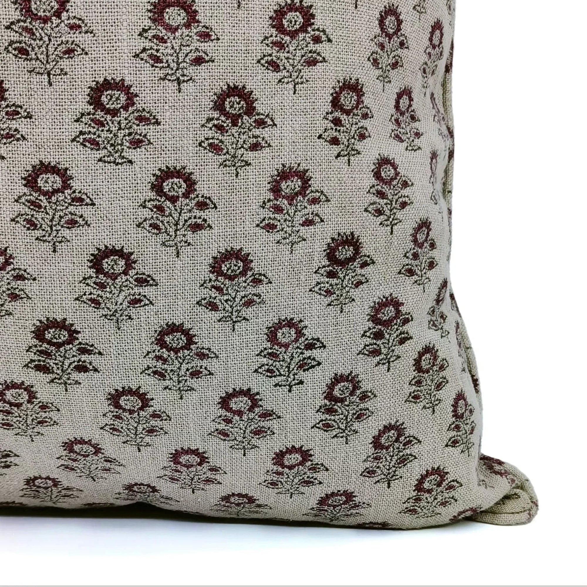 Floral patterned pillow on a white background