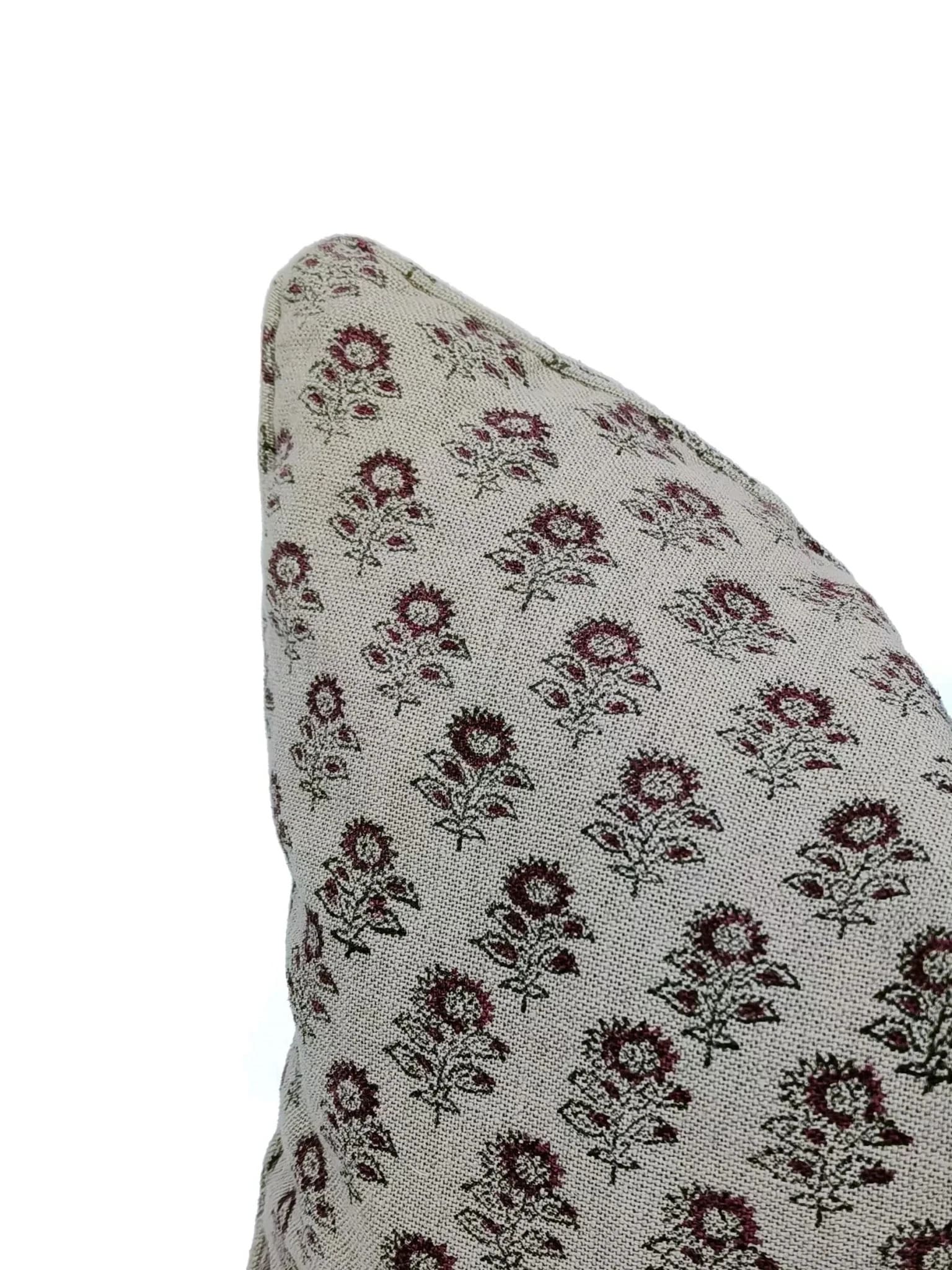 Floral patterned pillow on a white background