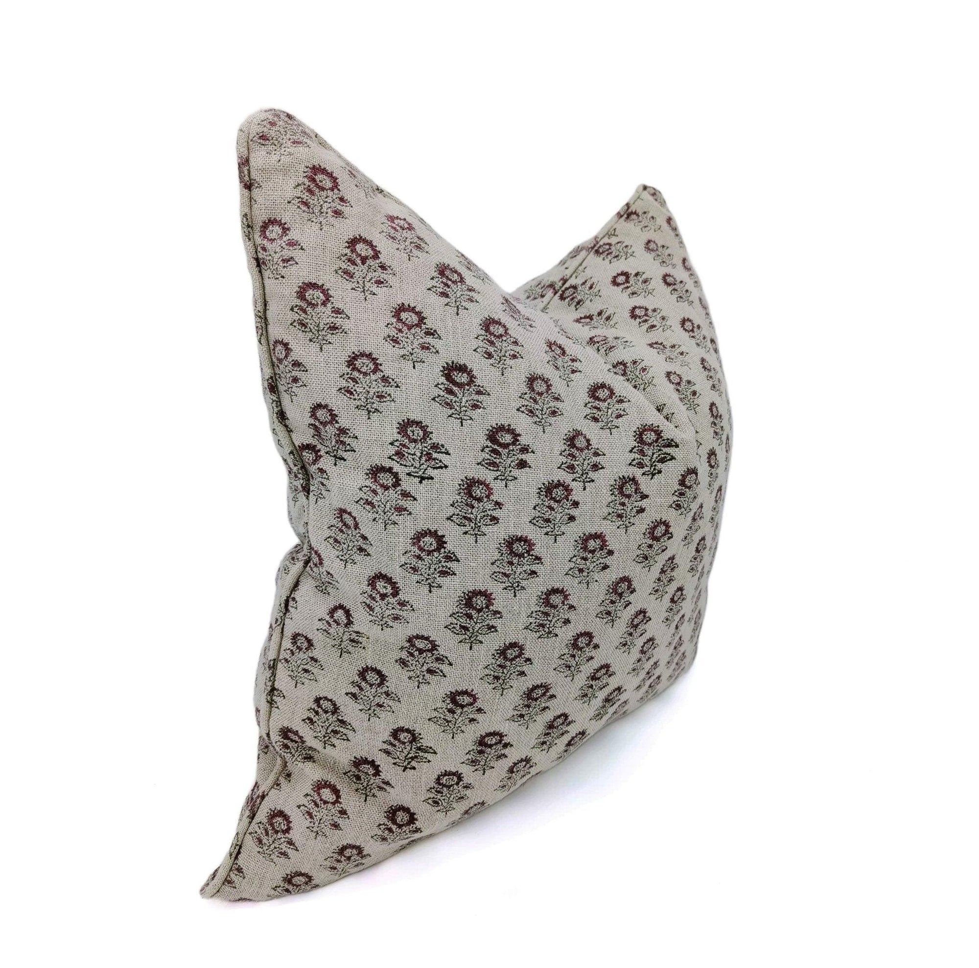 Floral-patterned pillow on a white background