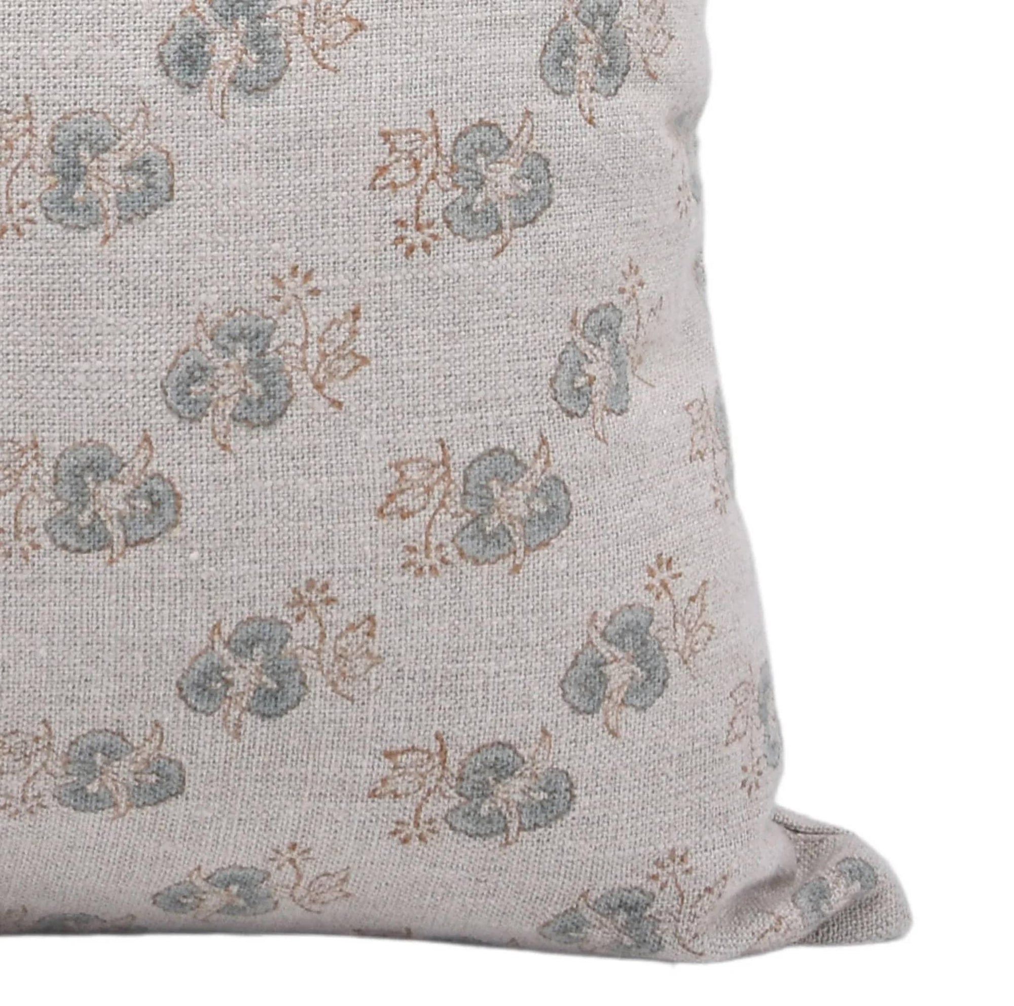 Floral patterned pillow on a white 