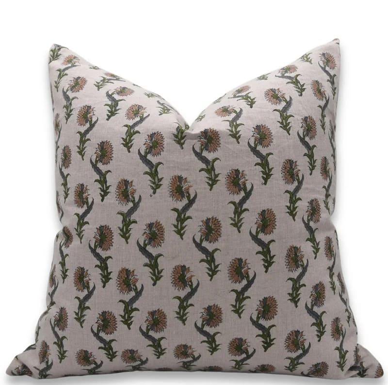 Decorative pillow with floral pattern on a light background