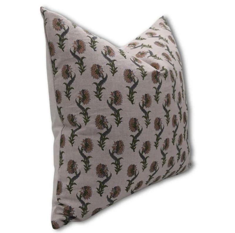 Decorative pillow with floral pattern on a plain background