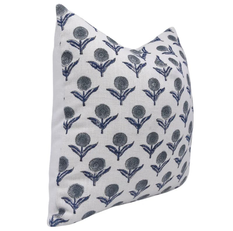 Decorative pillow with blue floral pattern on off white linen fabric 