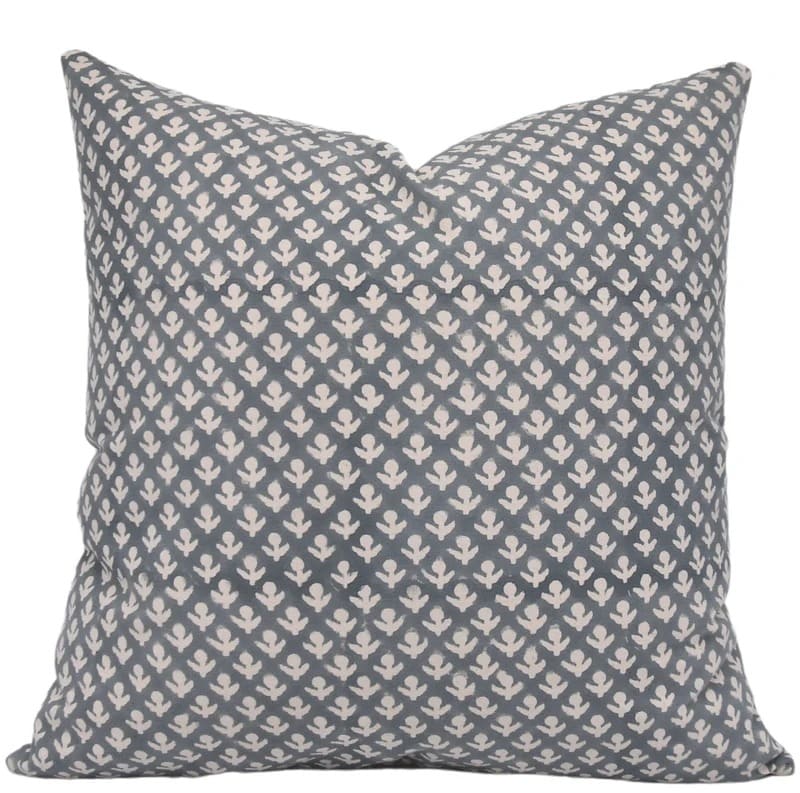 Decorative pillow with geometric pattern on a white background