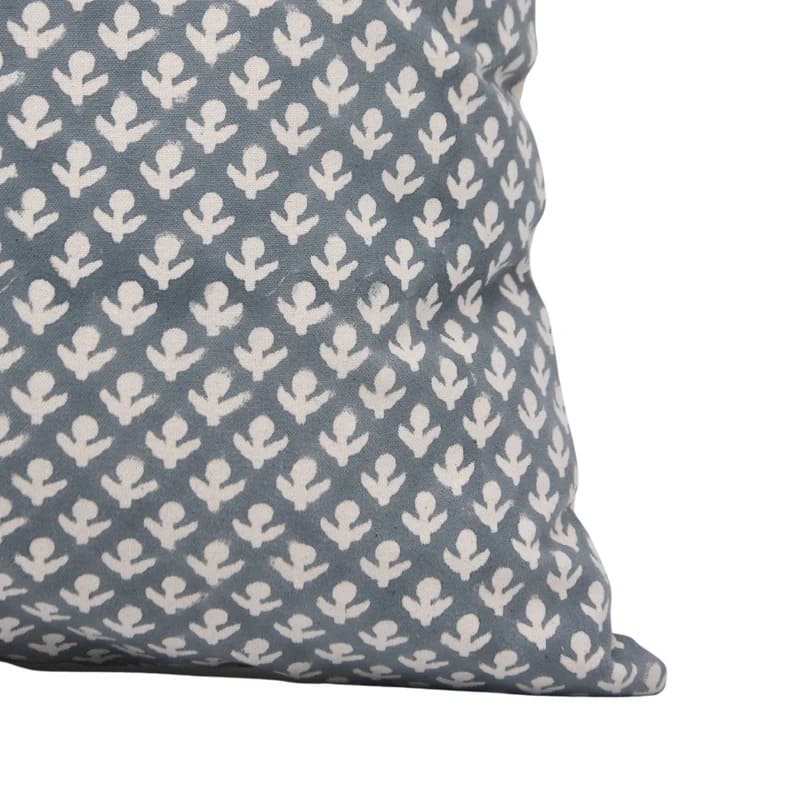 Gray pillow with white geometric pattern on a white background