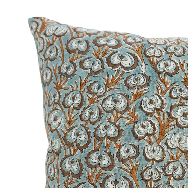 Decorative pillow with floral pattern on a white background
