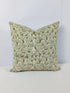 Green Decorative pillow with floral pattern 