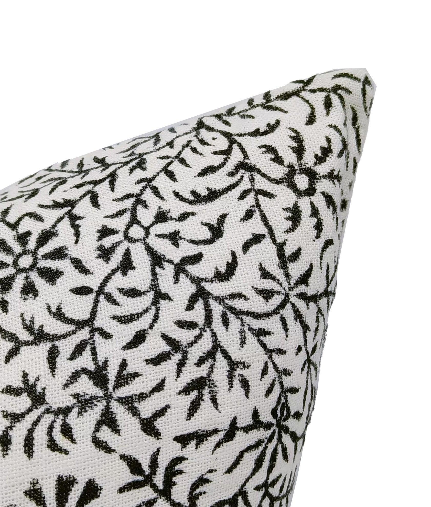 Decorative pillow with black floral pattern for living room decor 