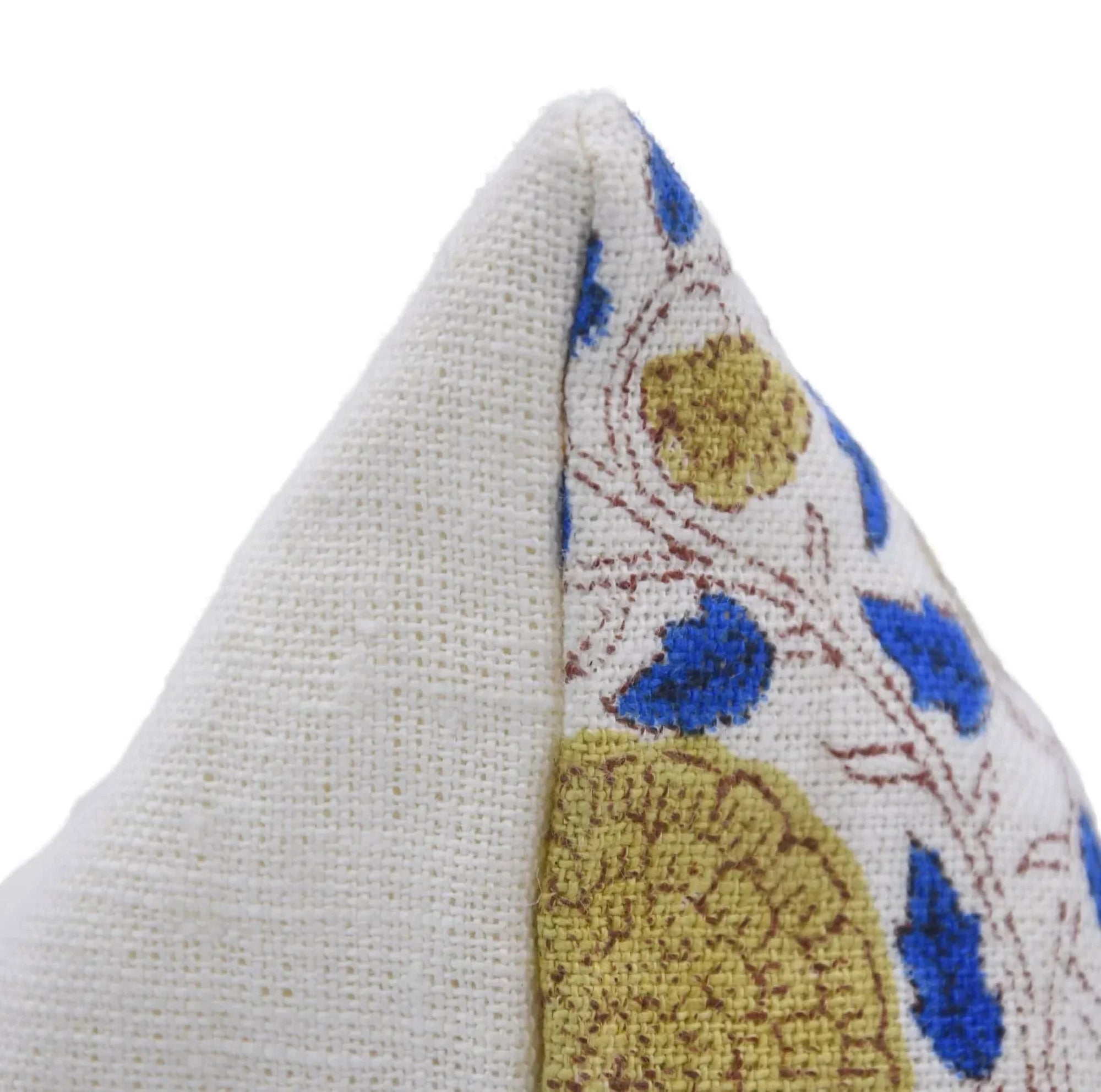 Close-up of a fabric triangle with floral pattern on a white background