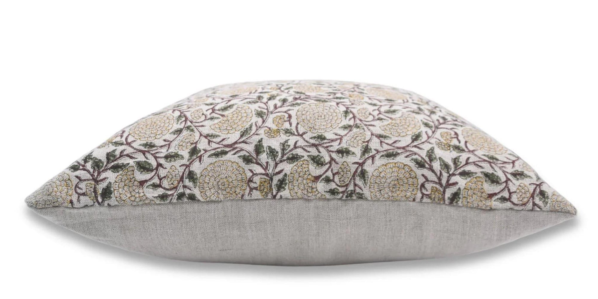Decorative pillow with floral pattern on a white background