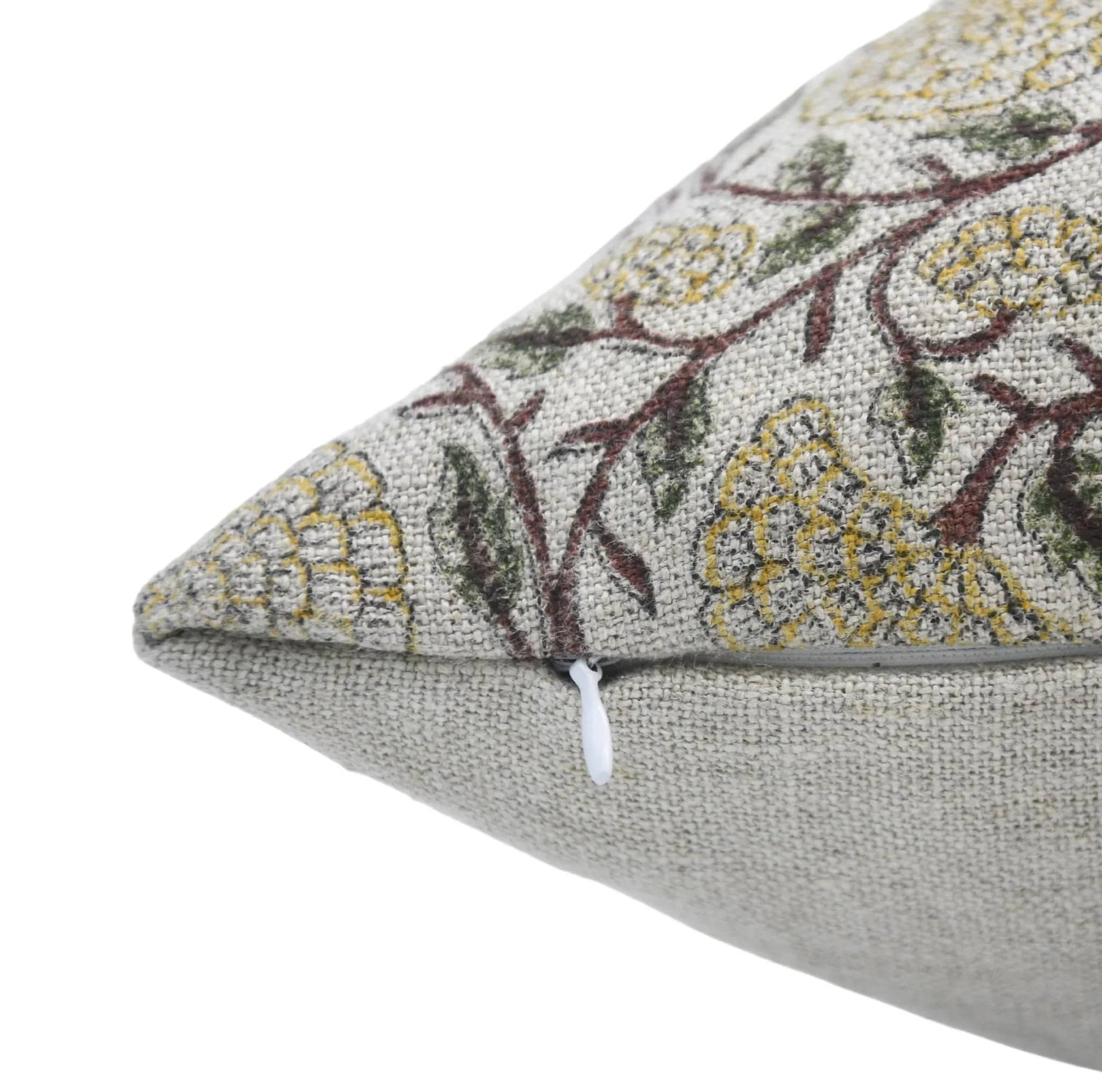 Floral patterned cushion on a white background