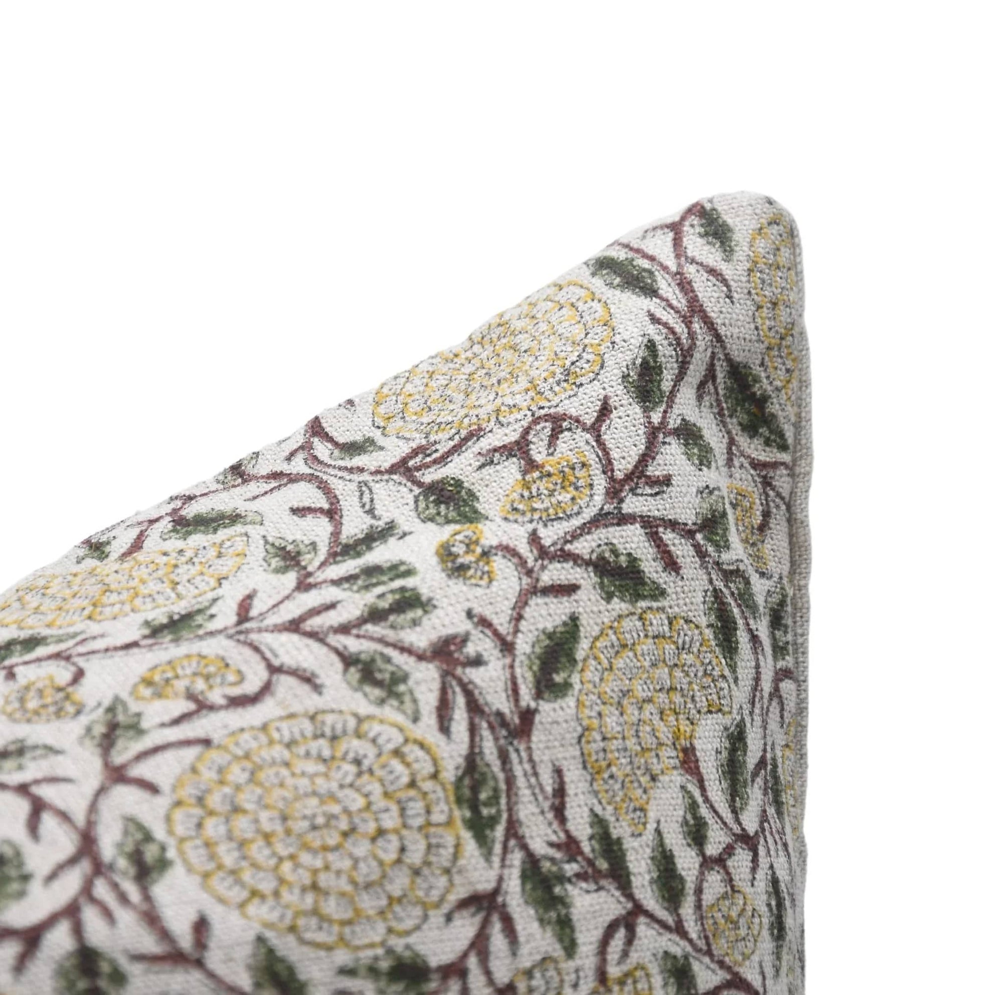 Floral patterned fabric corner on a white background