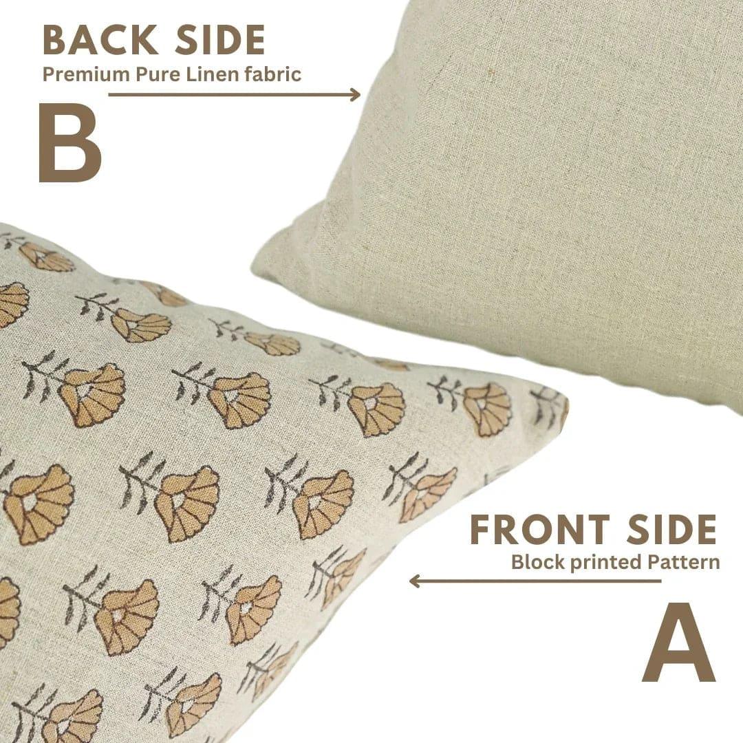 Two pillows showing front and back sides with floral patterns on a white background.