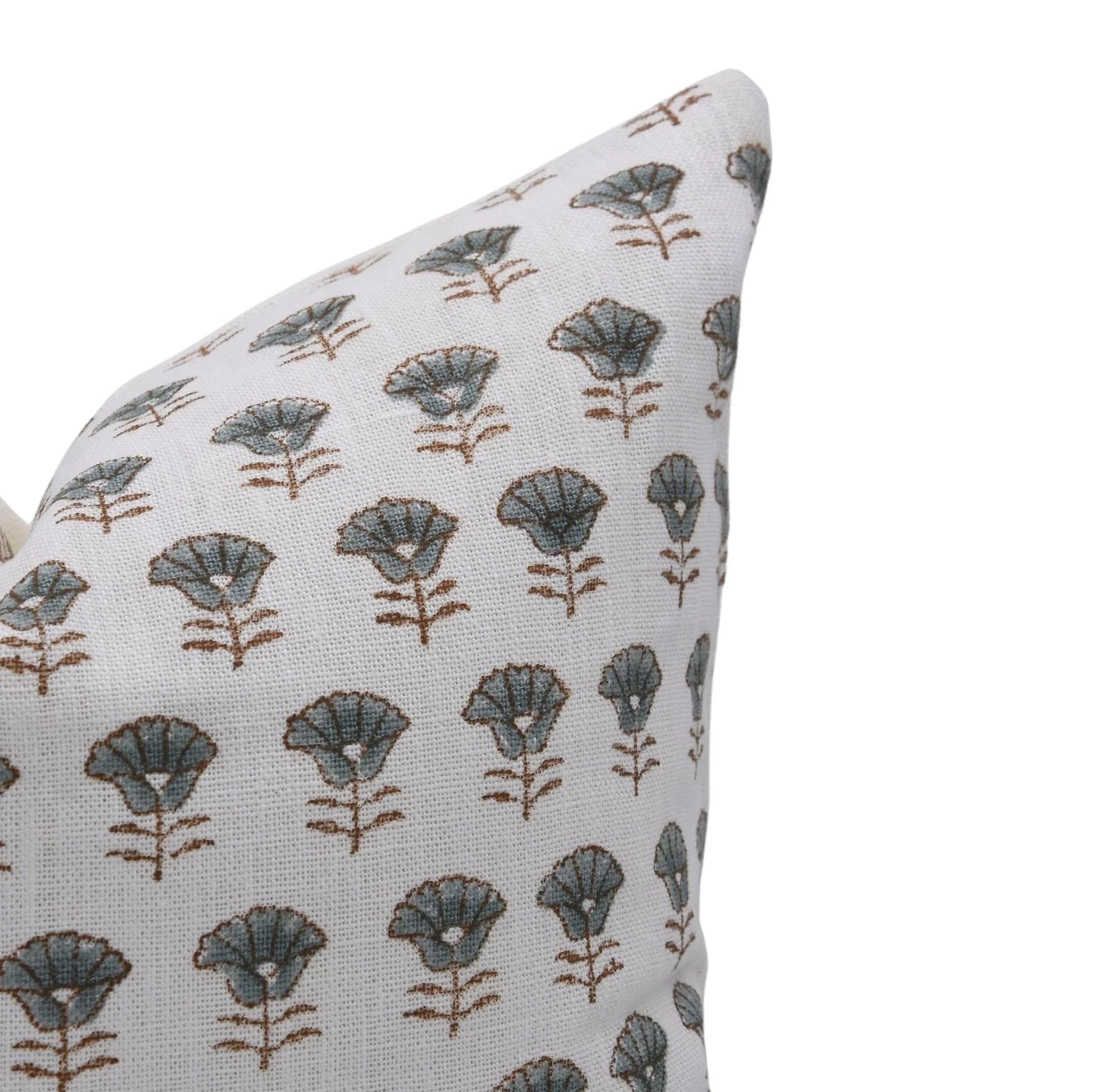 Decorative pillow with floral pattern on a white background