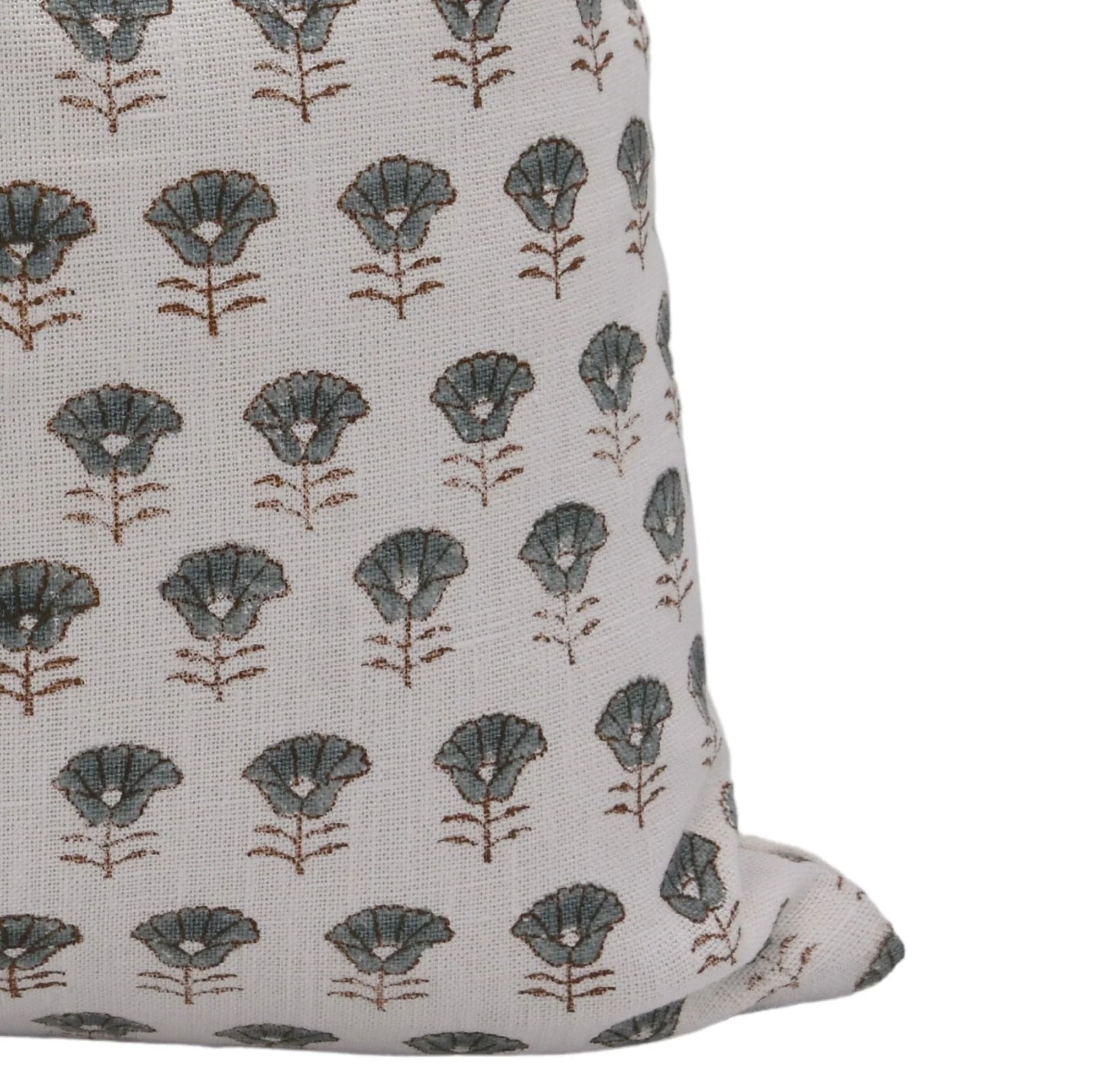 Floral patterned fabric pillow cover with knife edges 