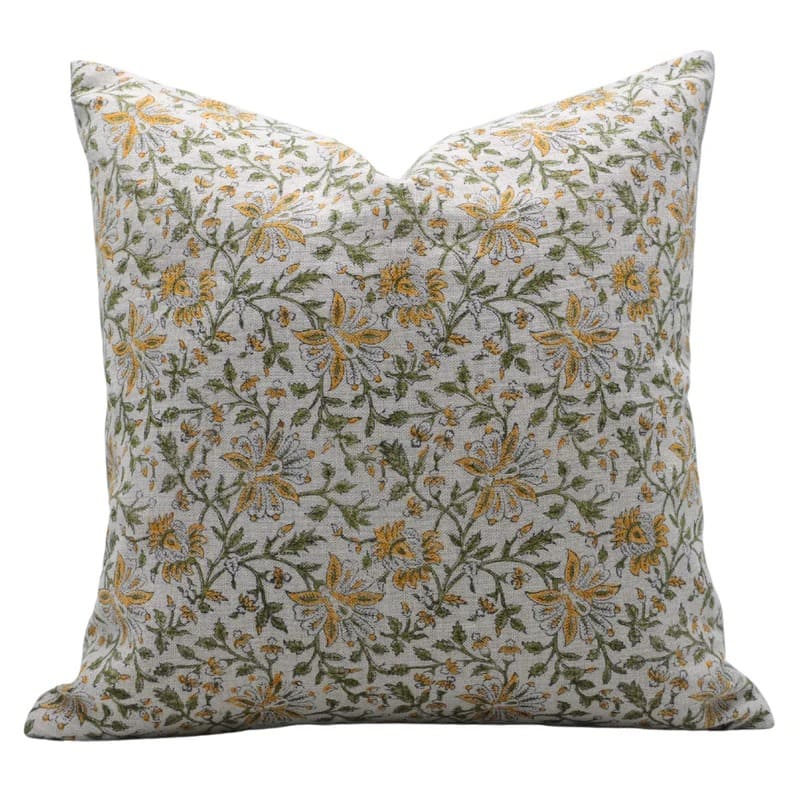 Floral patterned pillow on a white background

