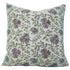 Floral patterned pillow on grey fabric
