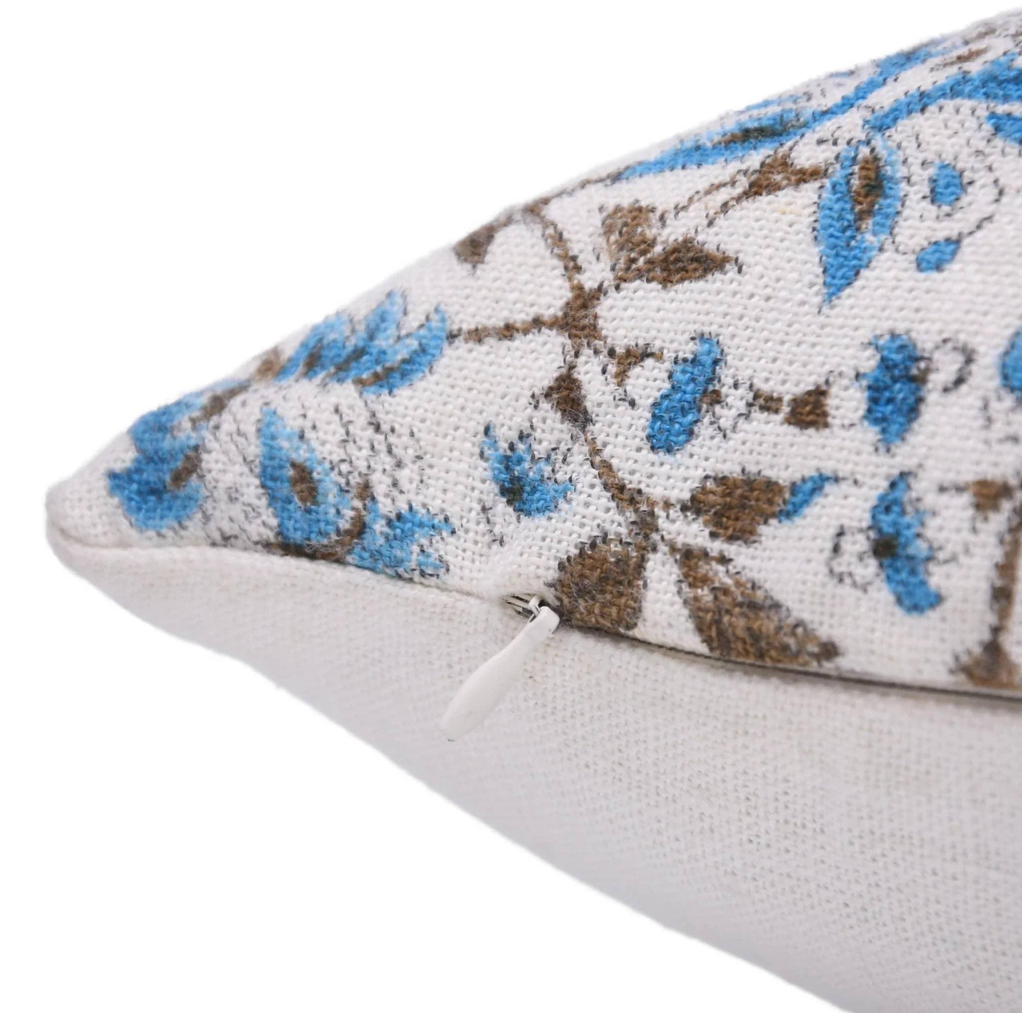 Close-up of a Blue and brown Floral patterned pillow 