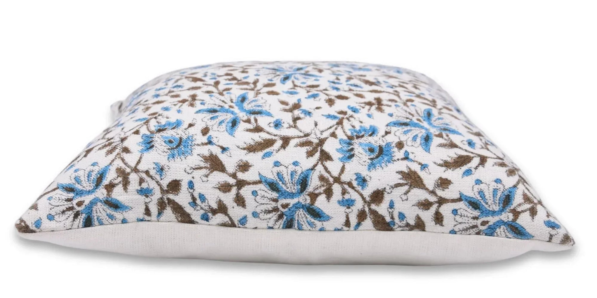 Floral-patterned pillow on a white background