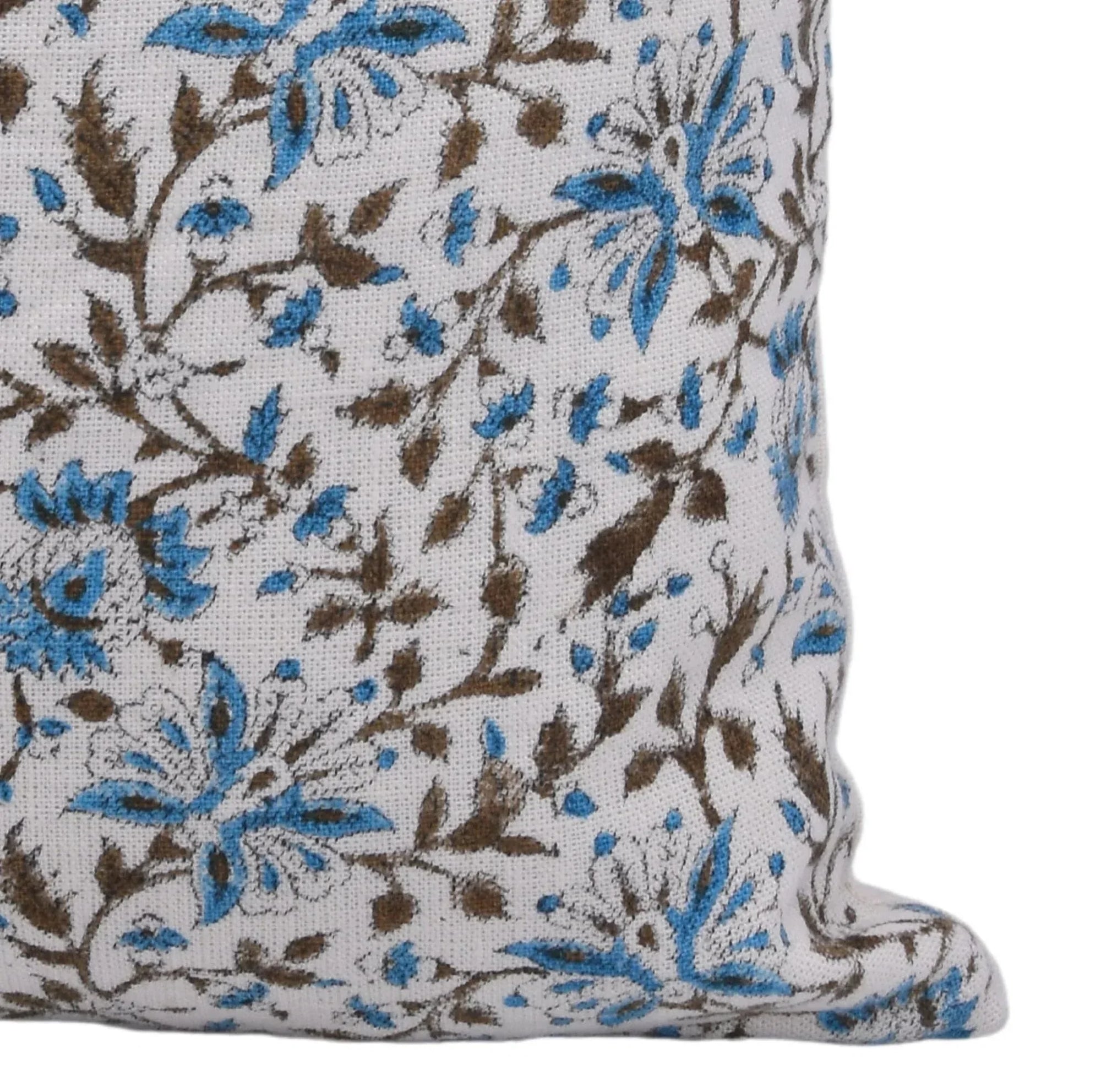 Floral patterned fabric with blue and brown flowers on a white background