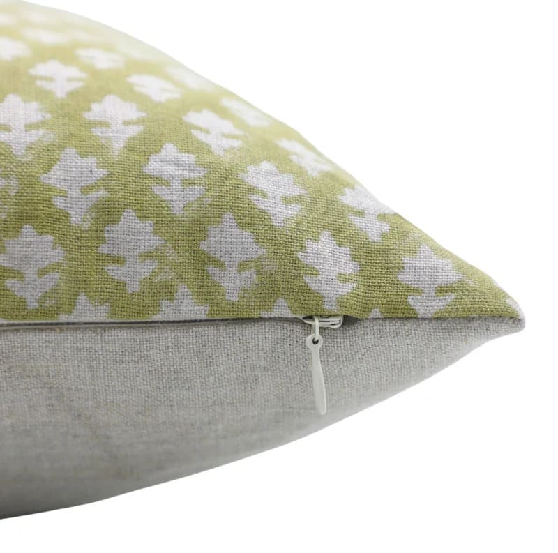 Two pillows with different patterns and colors on a white 