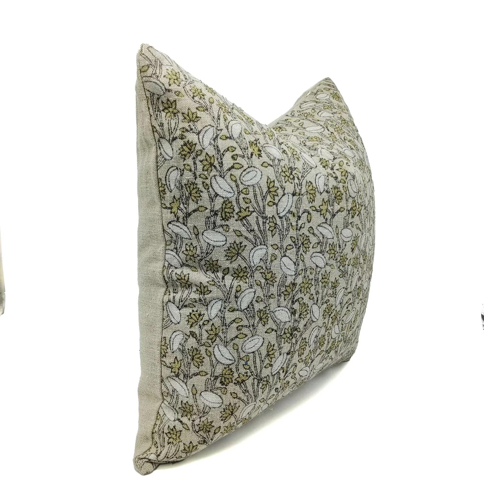 Decorative pillow with floral pattern on a white background