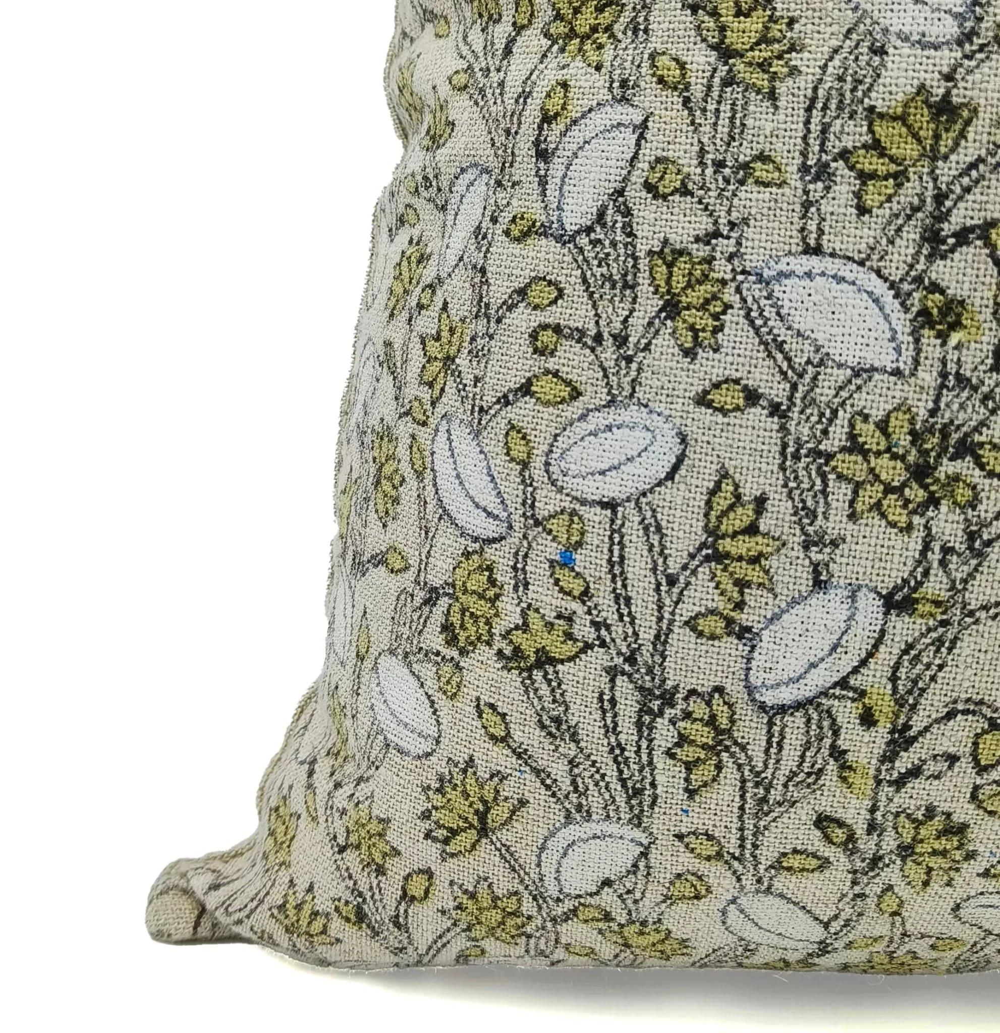 Decorative pillow with floral pattern on a white background