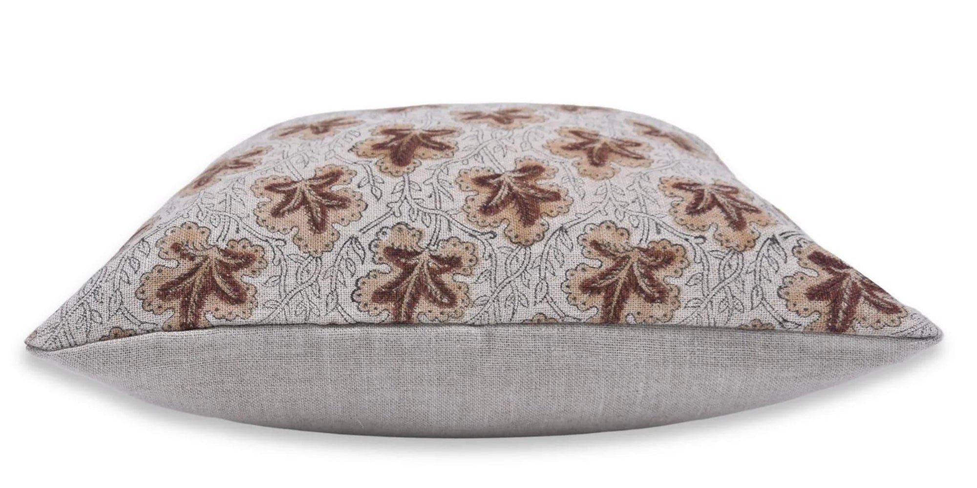 Decorative pillow with floral pattern on a white background
