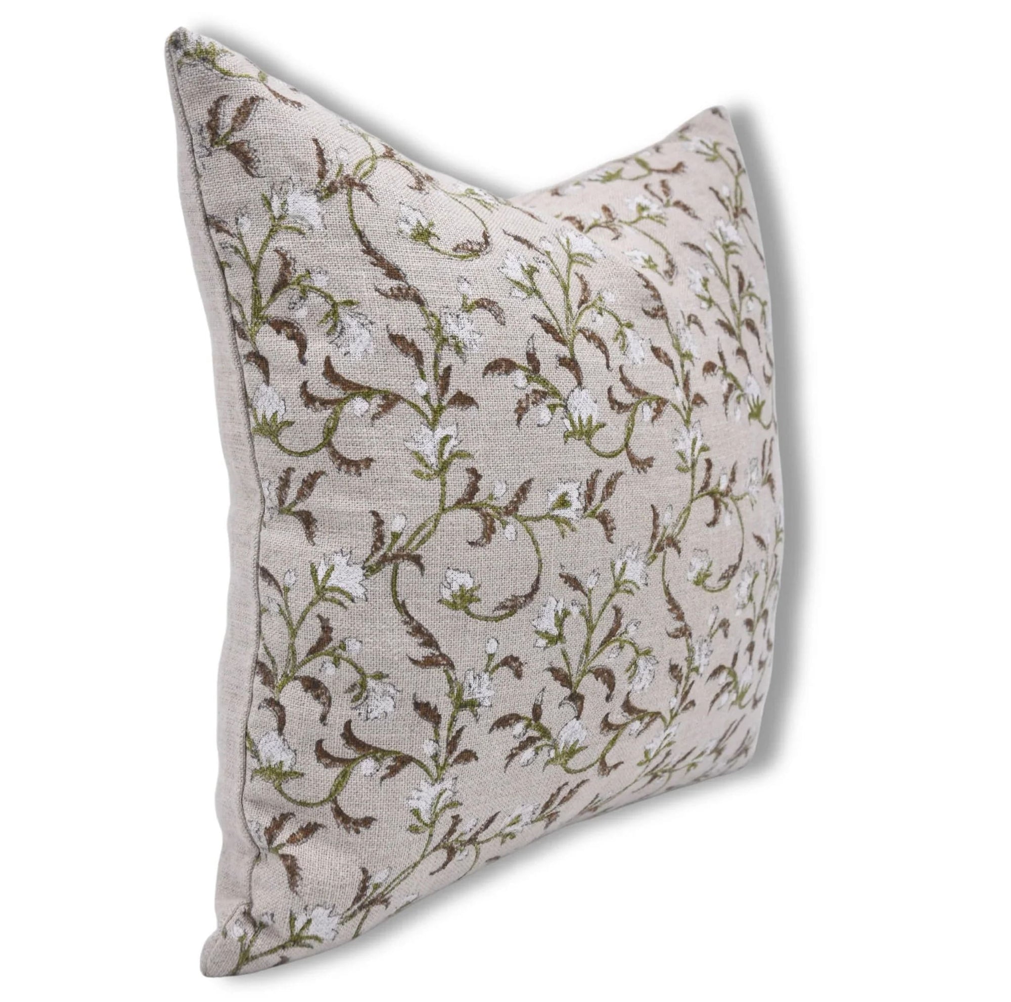 Decorative pillow with floral pattern on a beige background