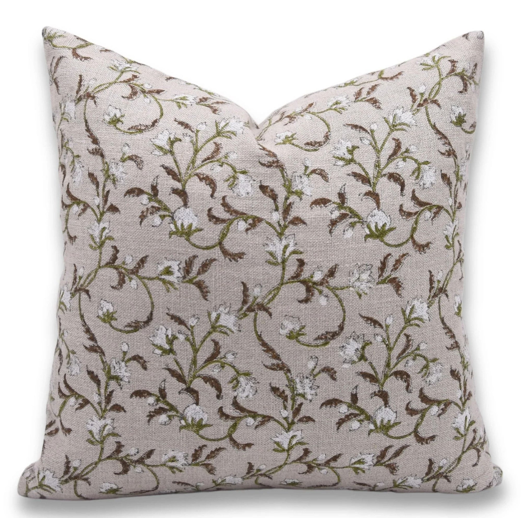 Decorative pillow with floral pattern on a beige background