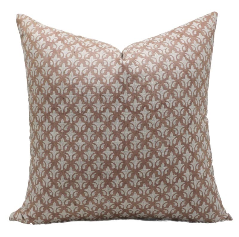 Decorative pillow with a brown geometric pattern on a white background

