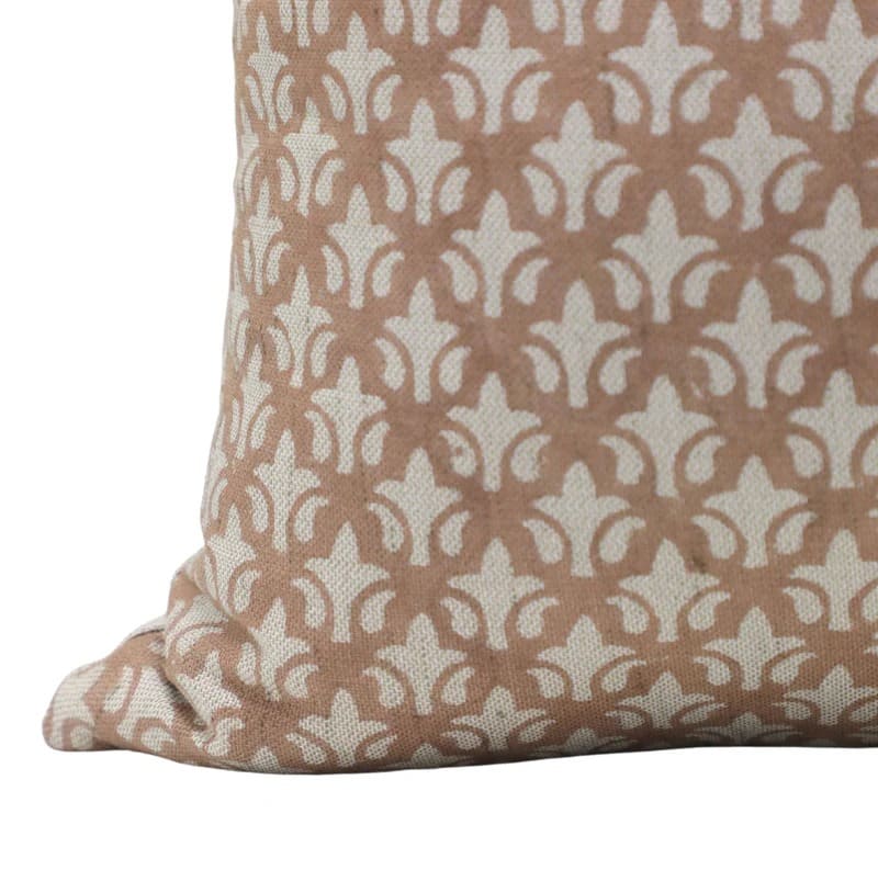 Patterned pillow with a geometric design on a plain background