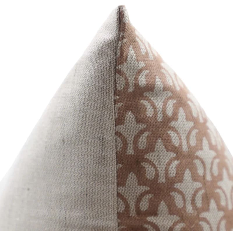 Two pillows, one plain gray and one with a brown and white pattern, on a white background.