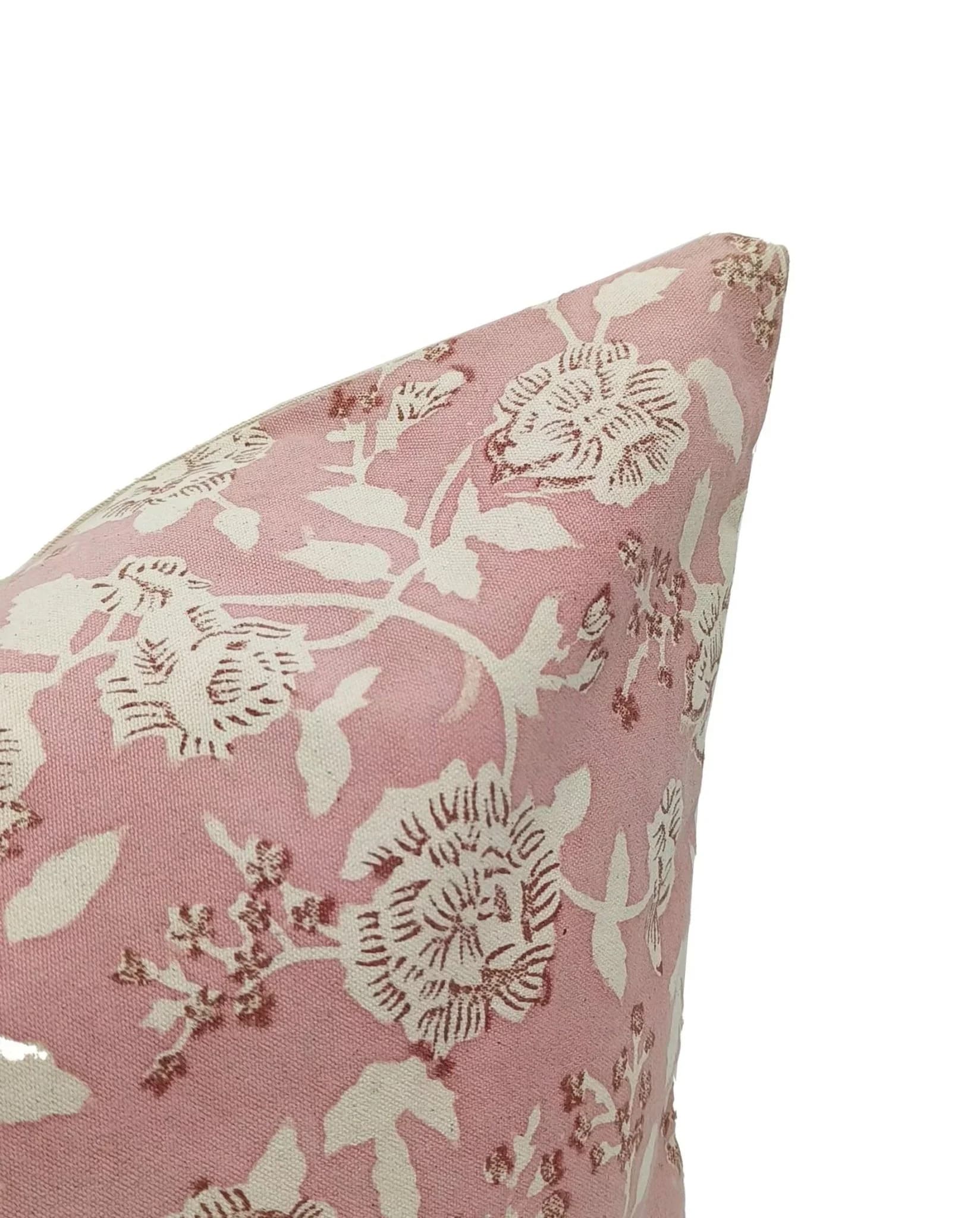 Floral patterned pillow on a white background