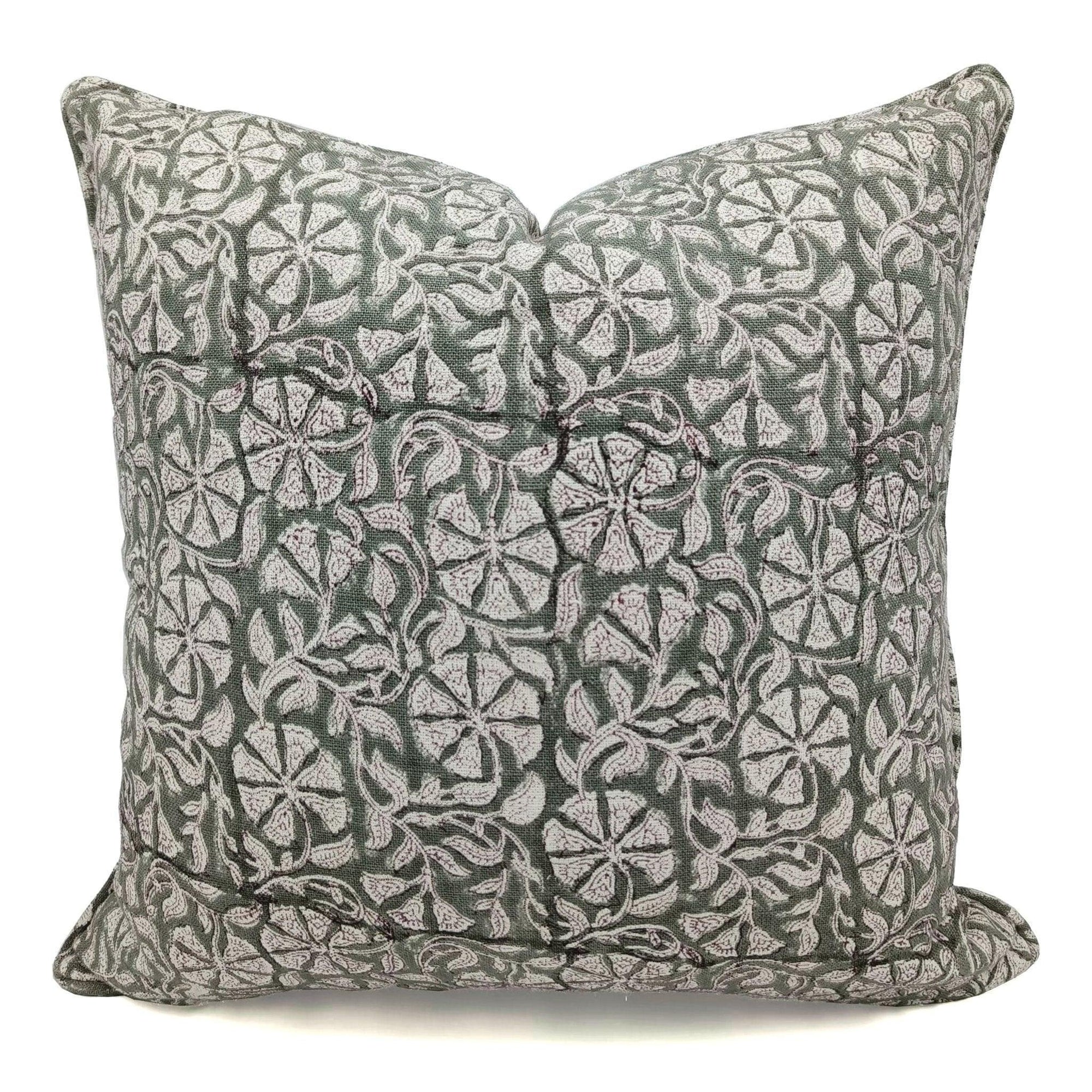 Decorative pillow with floral pattern on a white background
