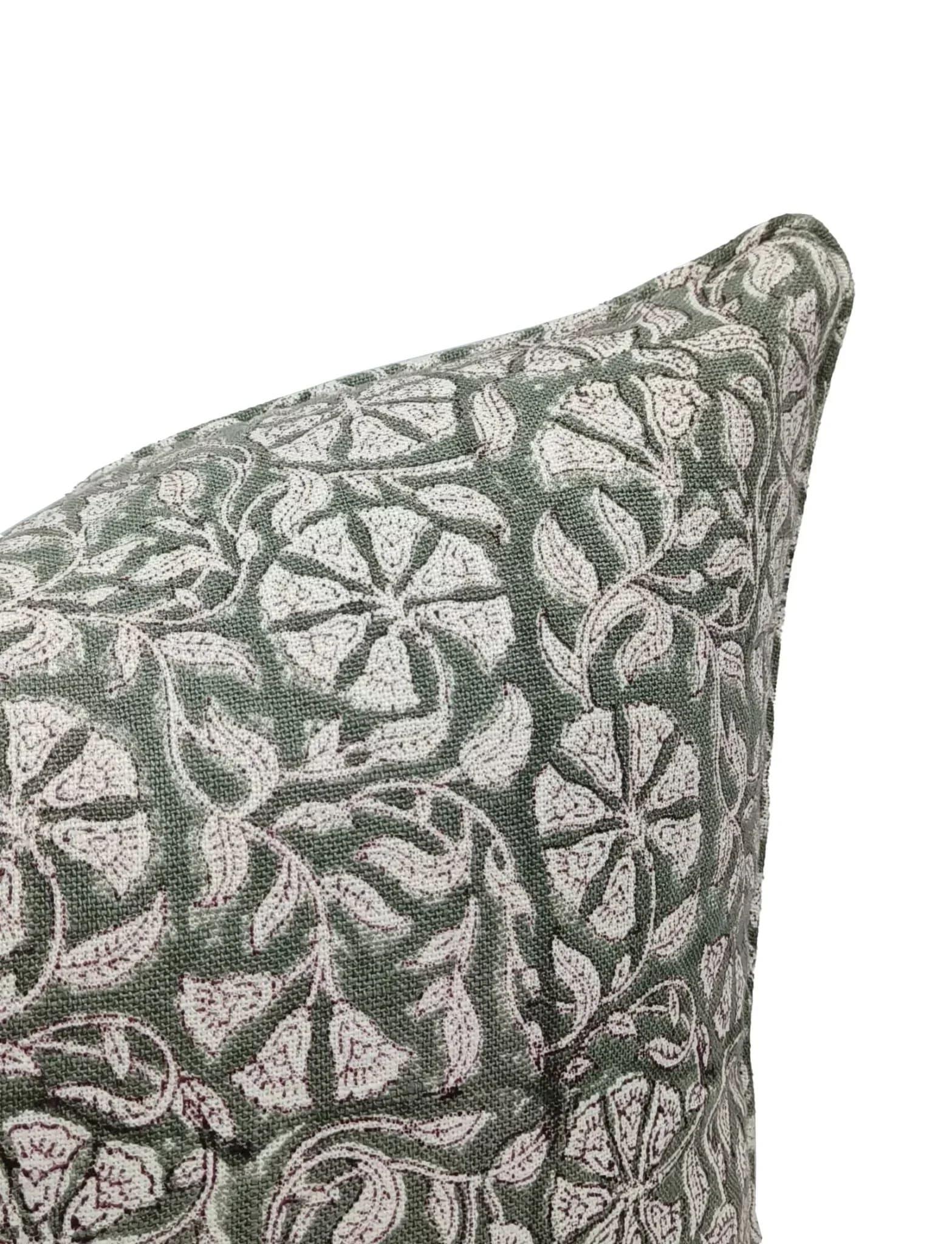 Patterned pillow with a floral design on a white background