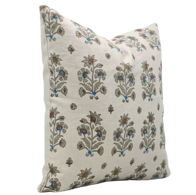 Decorative pillow with floral pattern on a white background

