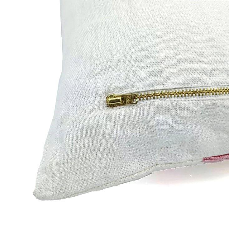 Decorative pillow covers with zippers designed for easy removal