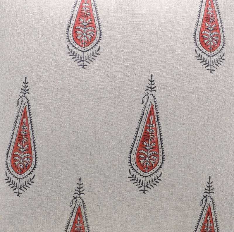 Patterned fabric with red and black teardrop shapes 