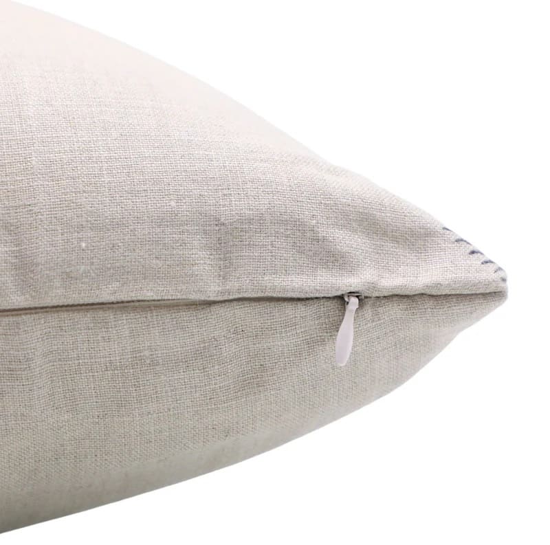 Close-up of a textured beige pillow 