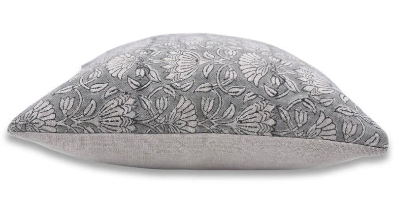 Gray floral-patterned pillow on a white background