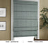 Drapes and Roman shades with designer fabric
