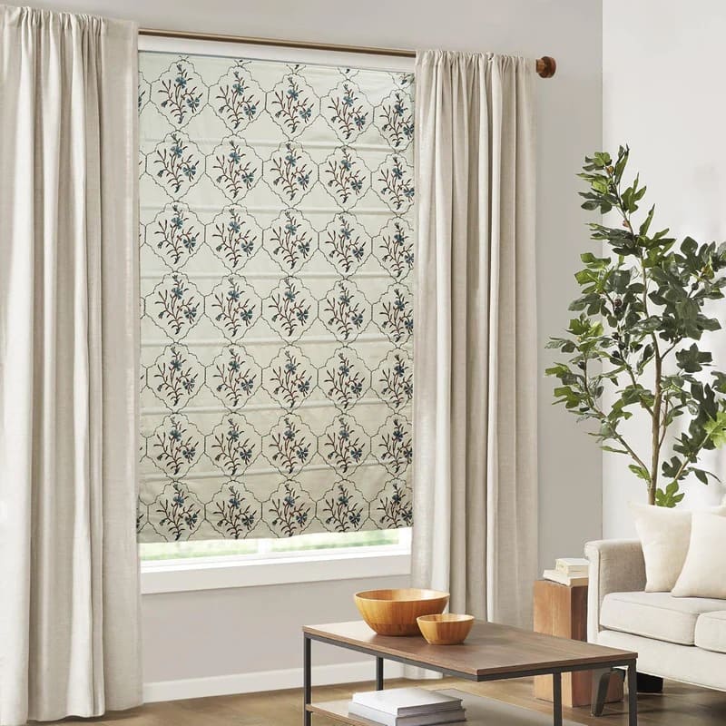 Roman shades with drapes in block print design