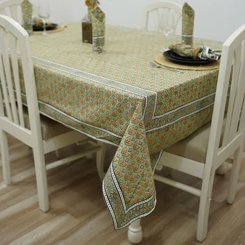 Bright bedroom decor featuring printed table cloth