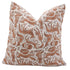 Decorative pillow with a brown and white pattern on a white background