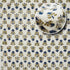 Green patterned cotton towel on counter