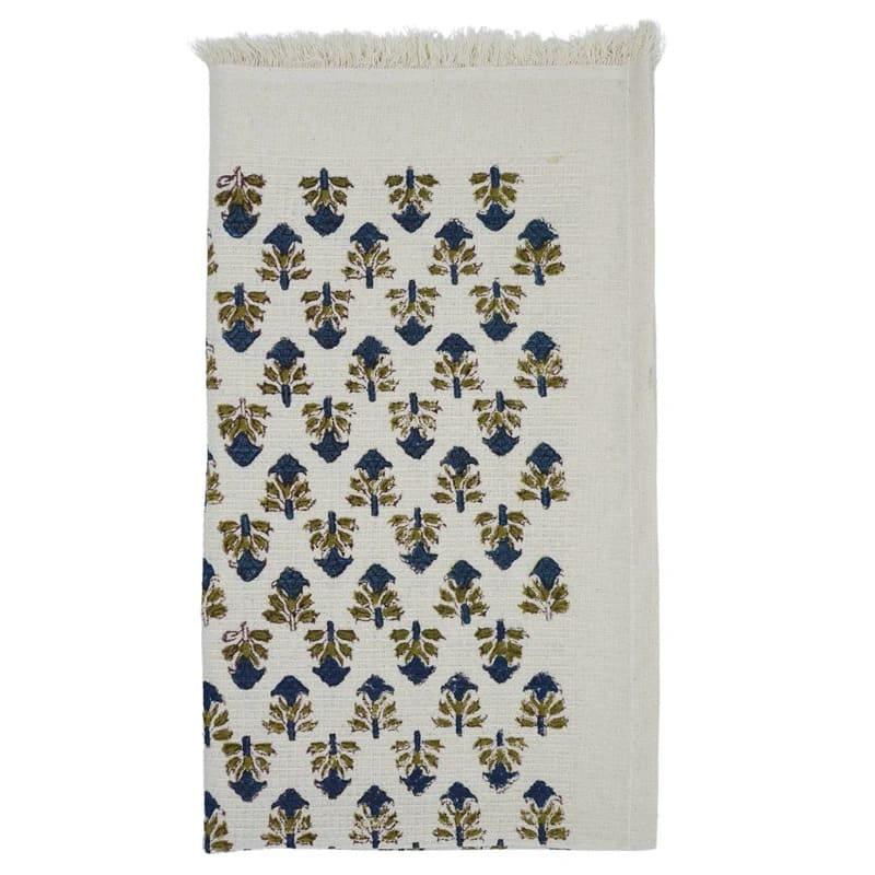 Green patterned towel on bathroom hook