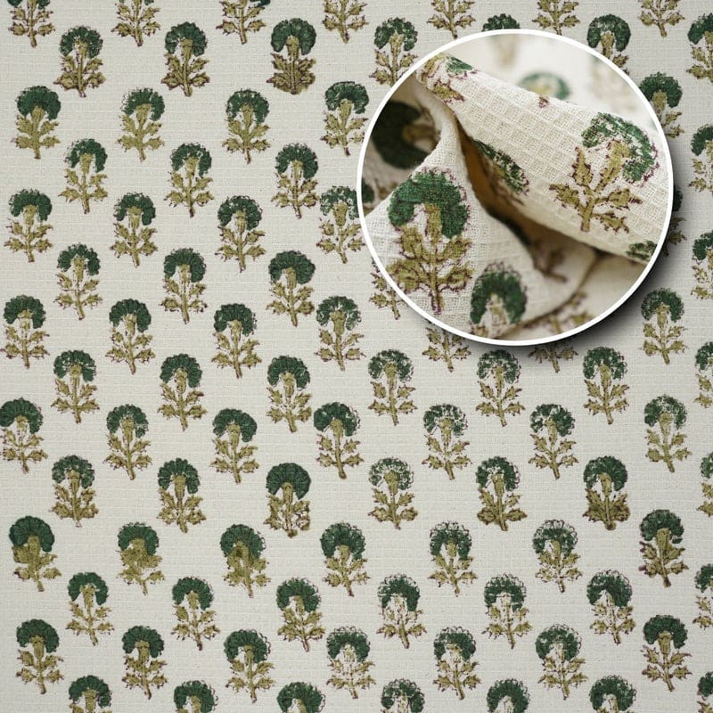 Green patterned towel neatly stacked